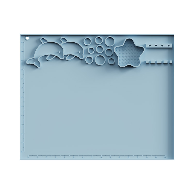 Loopy Doopy Silicone Creative Mat in soft blue, with dolphin moulds, paint wells, star water tray, brush rests and edge rulers